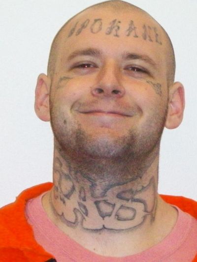Police say Brandon Mellon, 26, shot and killed Arnold Lomasson, 48, on Friday, Jan. 3, 2014. Mellon, a 10-time convicted felon, fled to Pasco, Wash., where police say he shot himself in the leg before being detained. (Department of Corrections)