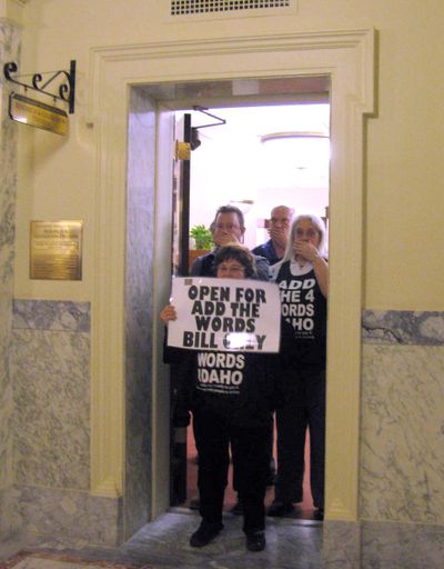 “Add the 4 Words” protesters block the entrance to the Idaho Legislature's bill-drafting offices on Monday, Mar. 16, 2015. (Betsy Russell / The Spokesman-Review)