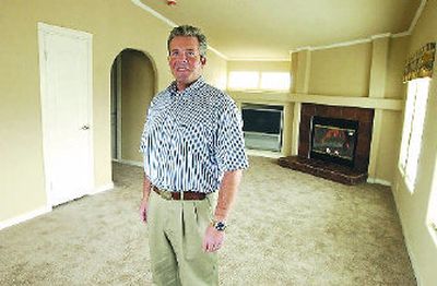 
Peter Zeman owns Independence Home Center Spokane,   which features Fleetwood Homes. He is standing in a four-bedroom home that sells for around $100,000. 
 (J. BART RAYNIAK / The Spokesman-Review)