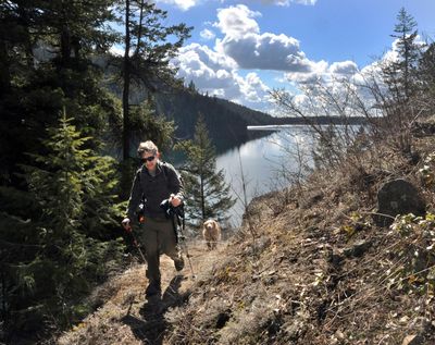 Mark Turner of Spokane leads a hike on the trail along Bead Lake, northeast of Newport, with the Inland Northwest Hikers Meetup group in 2011. An expansive forest and recreation project in Pend Oreille County would mean a new trailhead and parking at Bead Lake. (Rich Landers / The Spokesman-Review)