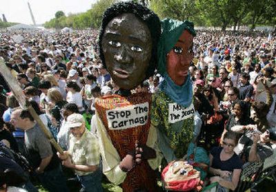 
Thousands of protesters gathered on the National Mall in Washington on Sunday to protest genocide in Darfur. 
 (Associated Press / The Spokesman-Review)