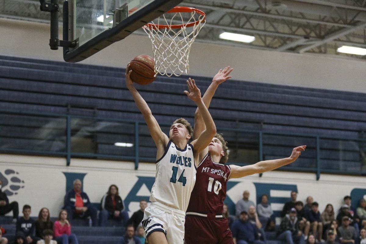 Kolton Mitchell drives for two of his 38 points Tuesday in Lake City’s 76-62 win over visiting Mt. Spokane.  (Cheryl Nichols/For The Spokesman-Review)