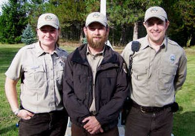 
New full-time rangers at Farragut State Park are, from left, Errin Bair, Jason Oliver and Adam Brown.
 (Herb Huseland / The Spokesman-Review)