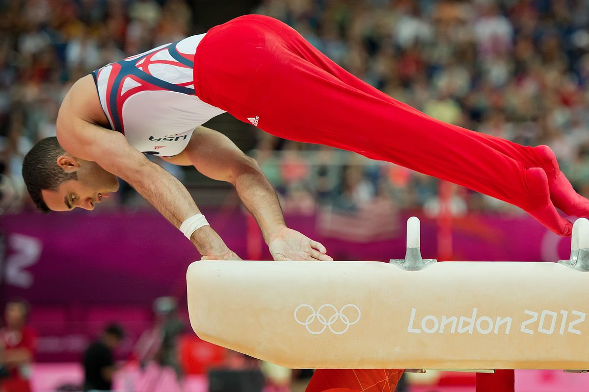 Danell Leyva of the U.S. loses his form and would eventually fall off of the pommel horse during Monday’s men’s gymnastics team final.