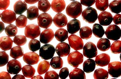 
Cranberries will be on many tables this Thanksgiving. The berries travel from as far away as the Northeast and as close as the Washington coast.  
 (Brian Plonka / The Spokesman-Review)