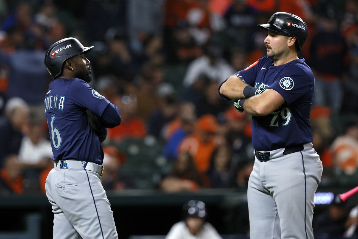 Seattle catcher Cal Raleigh celebrates with Randy Arozarena after hitting a two-run home run against the Detroit Tigers during the ninth inning in Game 3 of the American League Division Series at Comerica Park on Tuesday in Detroit. (Getty Images)