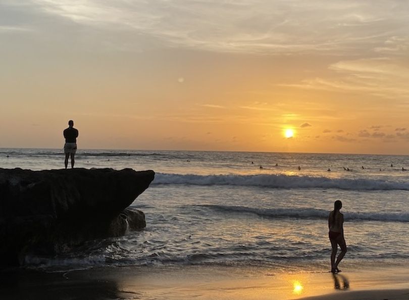 Even surfers pause when the sun set on Bali's beautiful Canggu Beach. (Dan Webster)