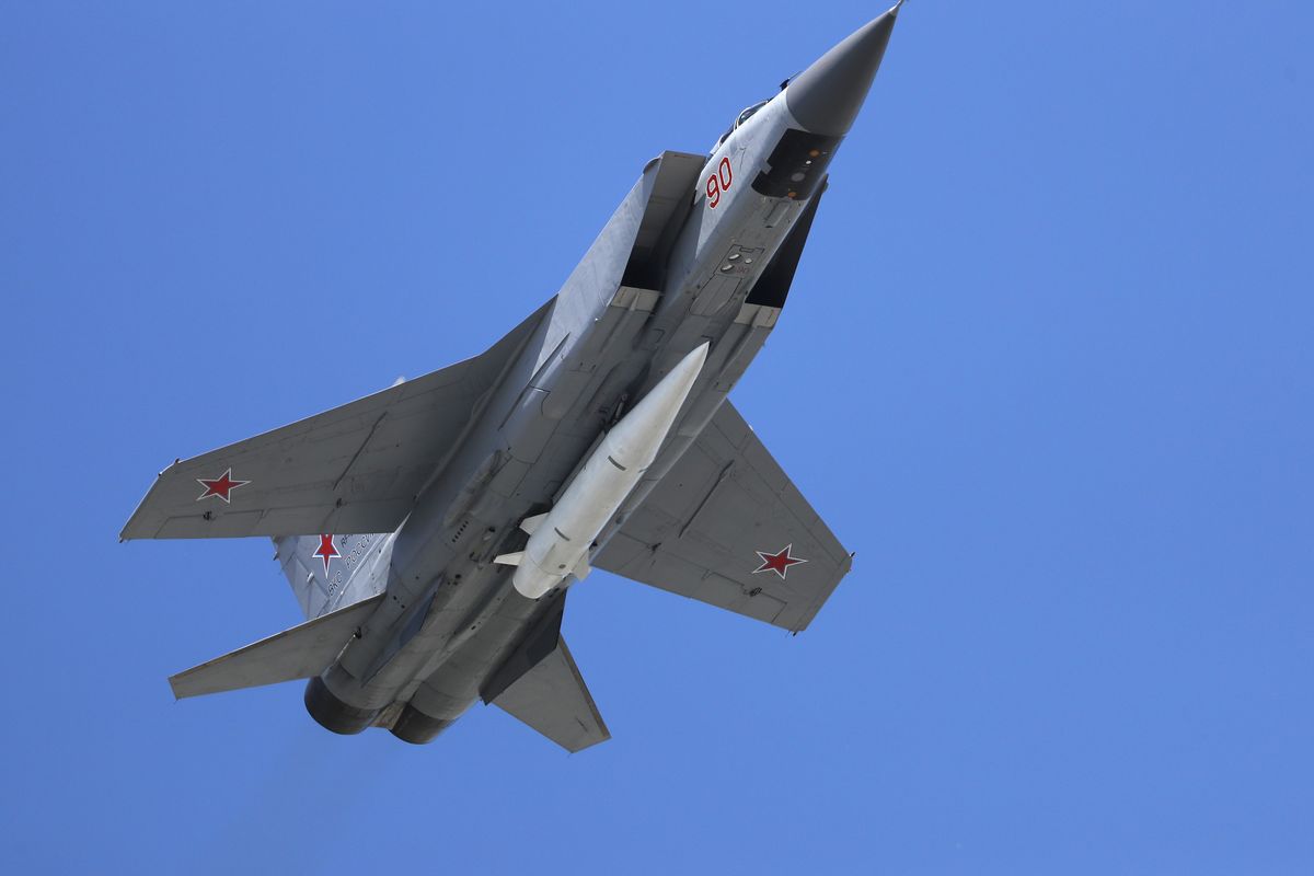 FILE In this file photo taken on Wednesday, May 9, 2018, a Russian Air Force MiG-31K jet carries a high-precision hypersonic aero-ballistic missile Kh-47M2 Kinzhal during the Victory Day military parade to celebrate 73 years since the end of WWII and the defeat of Nazi Germany, in Moscow, Russia. The Russian military says it launched maneuvers in the eastern Mediterranean that involve MiG-31 armed with the new Kinzhal hypersonic missiles, which arrived at the Russian airbase in Syria for the exercise.  (Pavel Golovkin)