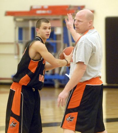 Shown in 2008 coaching a student Jordan Lupfer-Graham, Jamie Nilles has been named athletics director at West Valley High School, where he has coached for many years. (File)