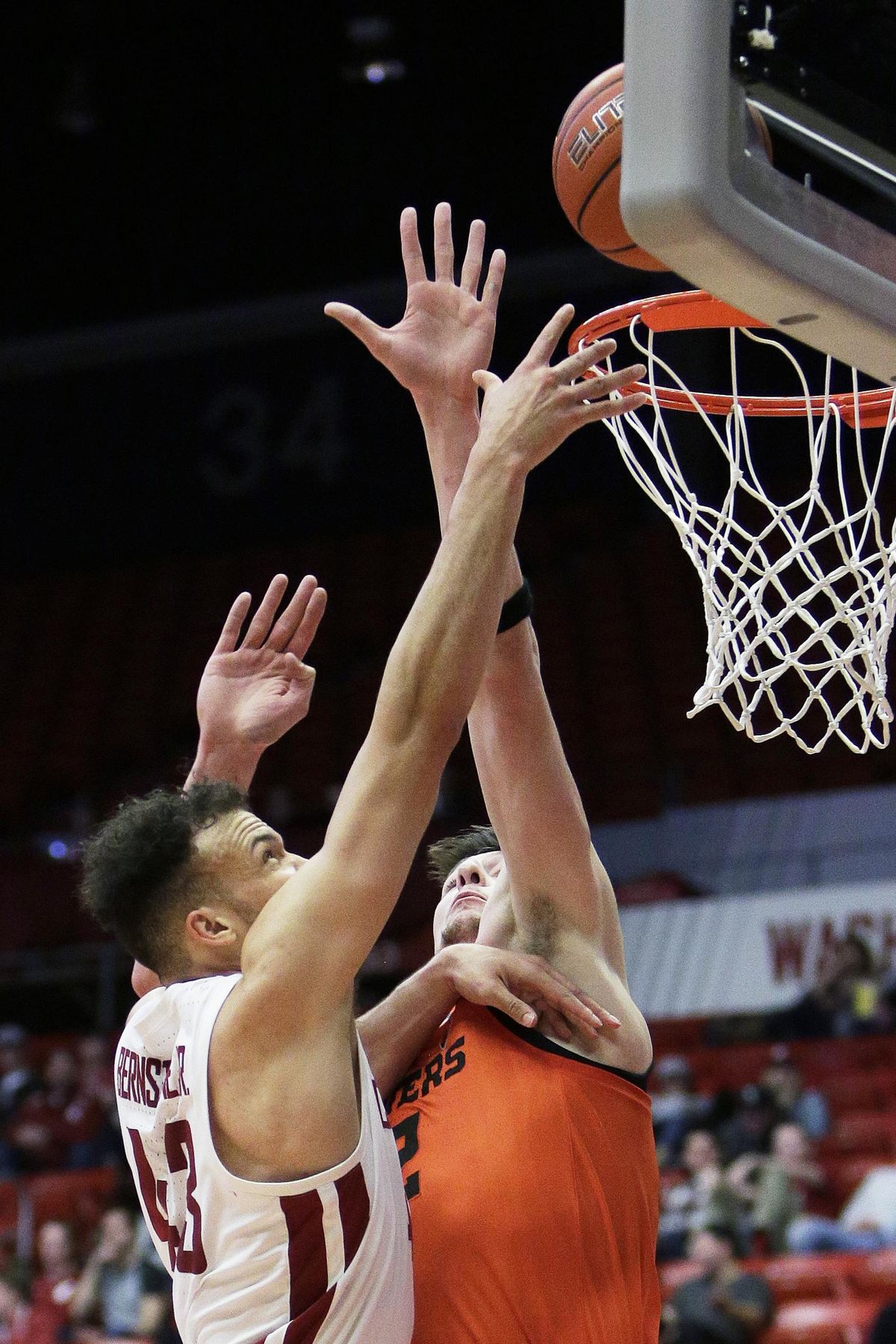 Washington State forward Drick Bernstine  shoots over Oregon State forward Drew Eubanks during the first half Saturday. (Young Kwak / AP)