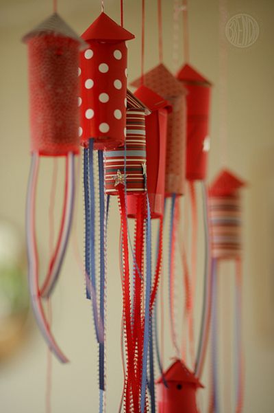 Fill these popper rockets with confetti made from scrap paper or newspapers for a fun 4th of July party decoration.  (www.alphamom.com)