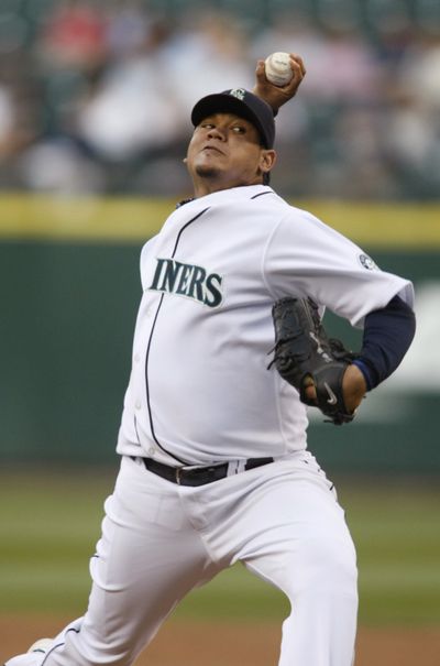 Mariners ace Felix Hernandez tossed eight shutout innings and struck out a career-high 13 batters.  (Associated Press)