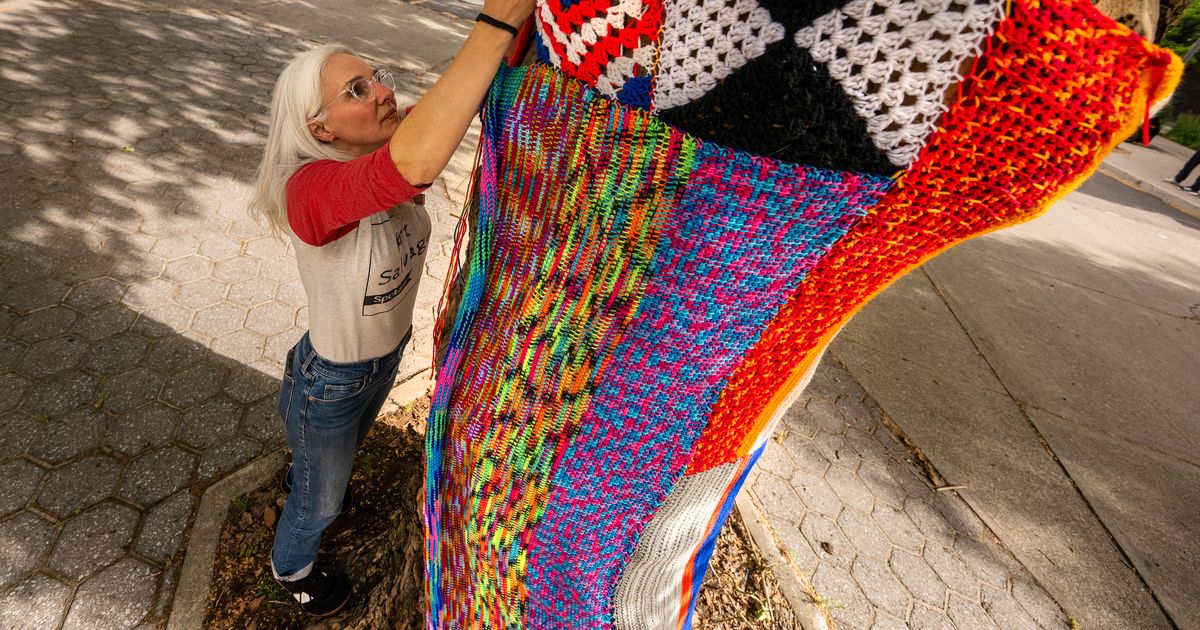 Downtown Spokane trees get cozy after ‘yarn bomb’
