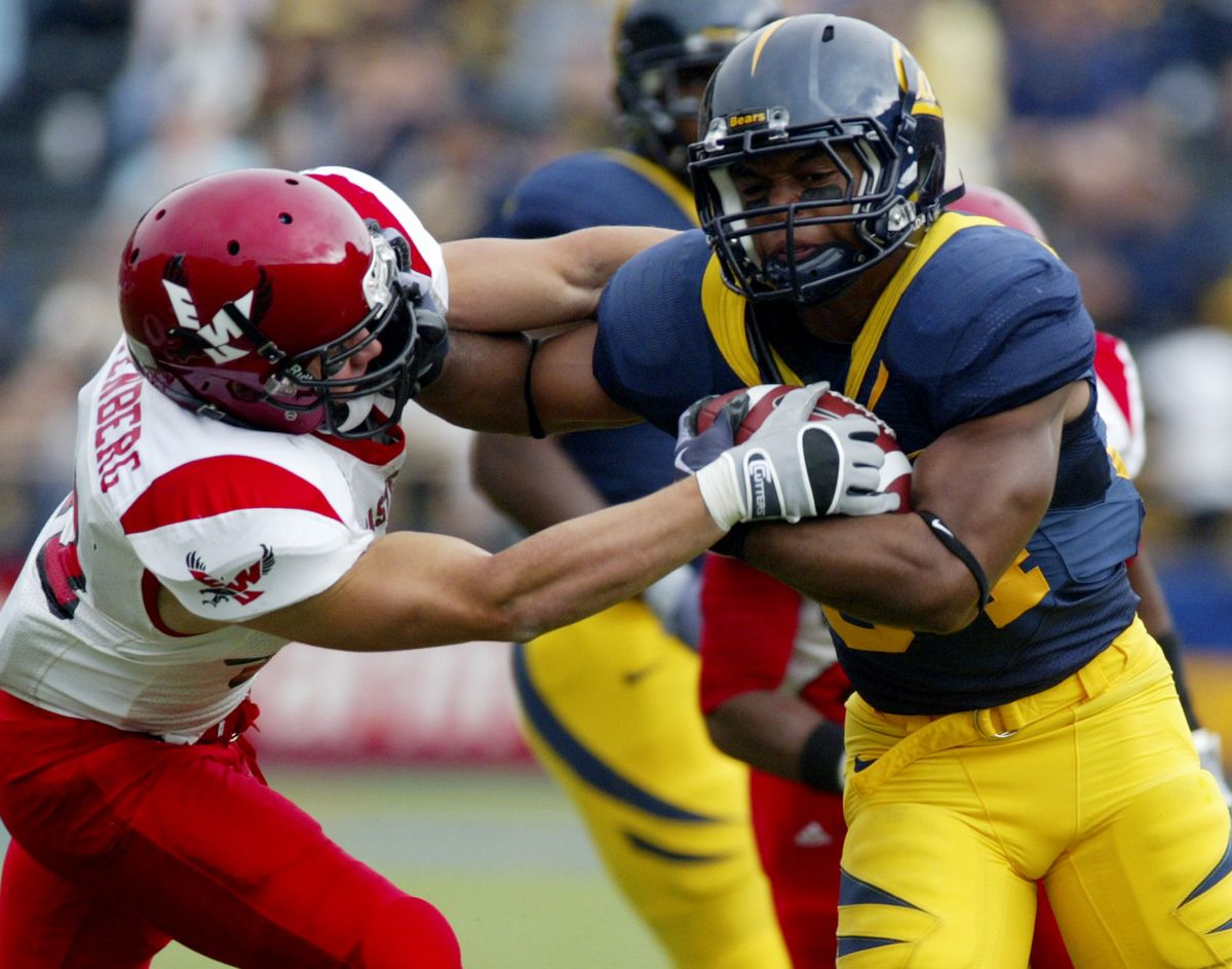 Cal’s Shane Vereen tries to outmuscle EWU tackler Billy Lechtenberg in the second half Saturday.  (Associated Press / The Spokesman-Review)