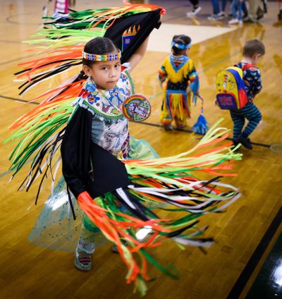 Celebrating Indigenous Peoples Day, Davianna Madera, 7, joins other dancers during a powwow on Monday, Oct. 14, 2019, at the Warehouse sports center on North Hamilton Street in Spokane. (Colin Mulvany / The Spokesman-Review)