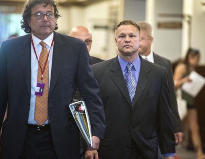 Dwayne Thurman, right, along with this attorney, Carl Oreskovich, arrives for his arraignment, July 12, 2017, in the courtroom of Superior Court Judge Annette Plese. Thurman pleaded not guilty to to the charge of first-degree manslaughter. (Dan Pelle / The Spokesman-Review)