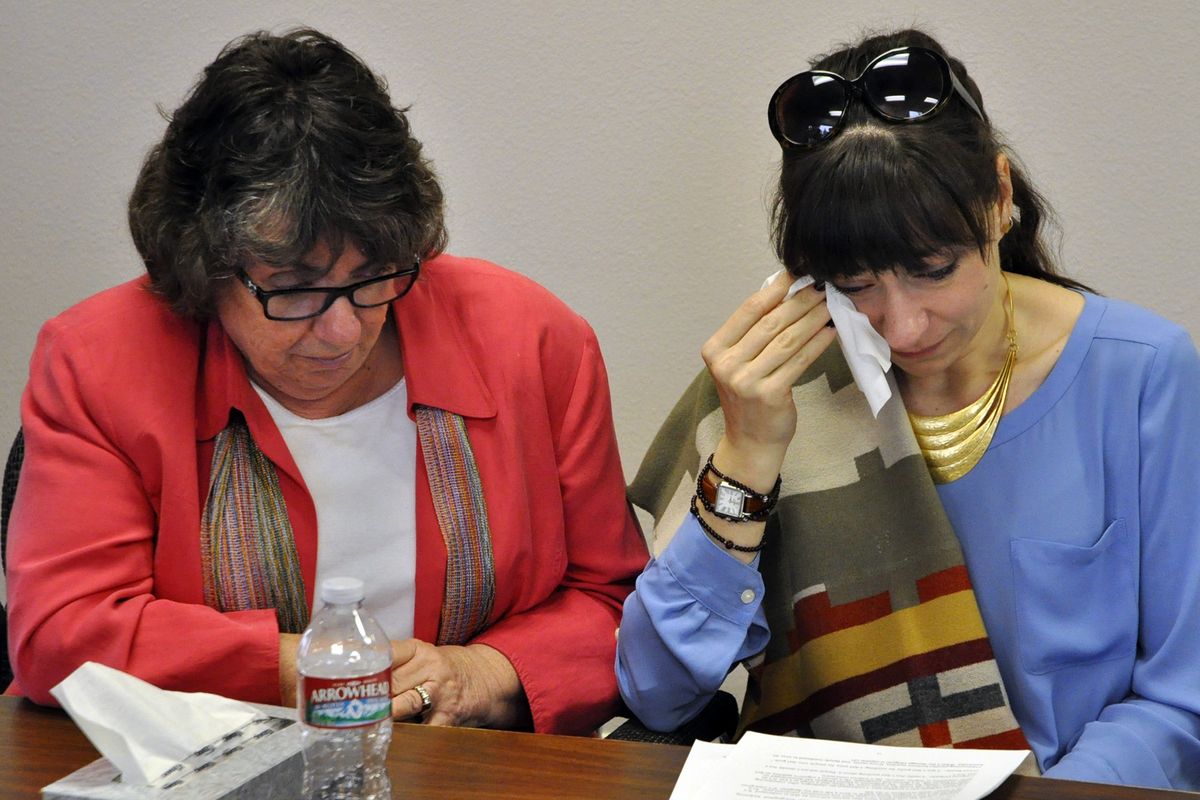 Marne Maykowskyj Nordean, right, pauses to wipe her eyes during testimony to the Indeterminate Sentencing Review Board as her mother, Judy Maykowskyj, looks on. (Jim Camden)