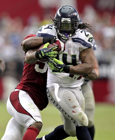 Seahawks’ Marshawn Lynch leads the NFL in rushing with 423 yards. (Associated Press)