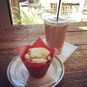 Iced Cubano latte with espresso and vanilla - and a baked treat on the side -- at Strada in Coeur d’Alene. (Adriana Janovich/SR)
