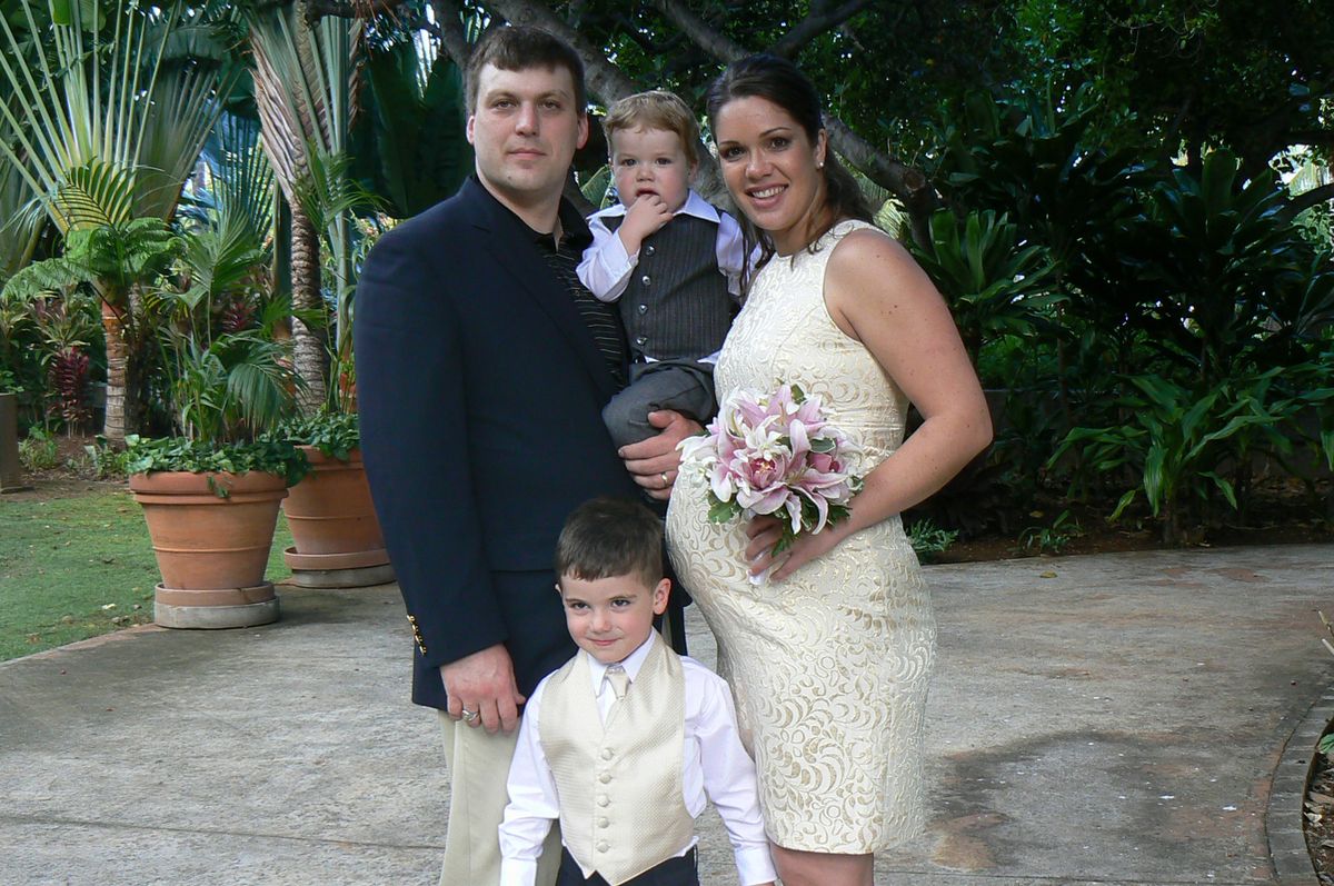 Now: Former Gonzaga Prep star Justin Strand, holding son Jared, wife Joy and son Joel. Photo courtesy of Justin Strand (Photo courtesy of Justin Strand / The Spokesman-Review)