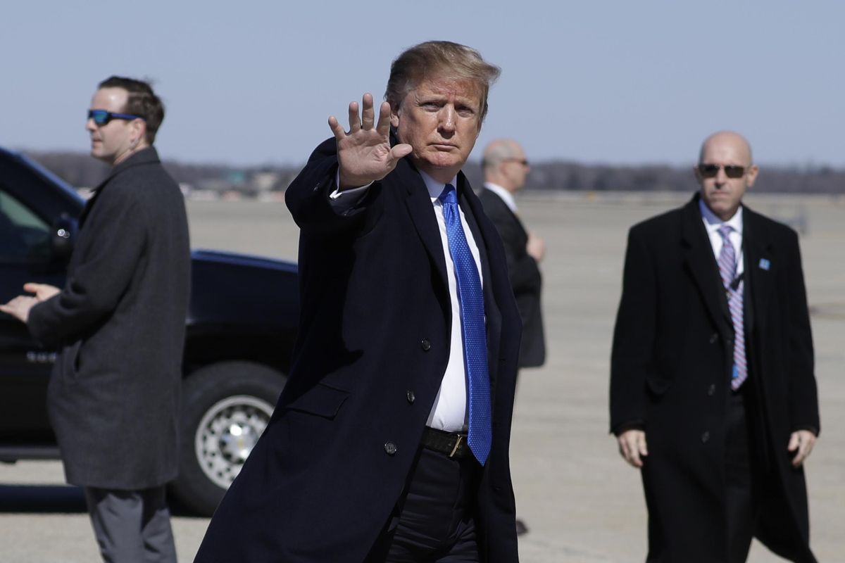 President Donald Trump walks to board Air Force One for a trip to Vietnam to meet with North Korean leader Kim Jong Un, Monday, Feb. 25, 2019, in Andrews Air Force Base, Md. (Evan Vucci / Associated Press)