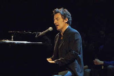 
In this photo released by VH1, Bruce Springsteen performs on the stage at the Two River Theater in Red Bank, N.J. The acoustic performance was taped for airing on VH1s Storytellers series. 
 (Associated Press / The Spokesman-Review)