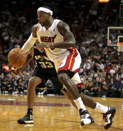 Heat’s LeBron James scored 23 in victory over the Spurs. (Associated Press)