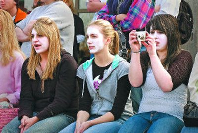 
From left, Barocka Rubenthaler, Tiffany Hunt and Jamie Doney  have their faces painted white to represent students who have died in auto wrecks. West Valley High School students were watching a mock crash outside the school Friday. Students who are members of the Washington Drug Free Youth presented the program. 
 (CHRISTOPHER ANDERSON / The Spokesman-Review)