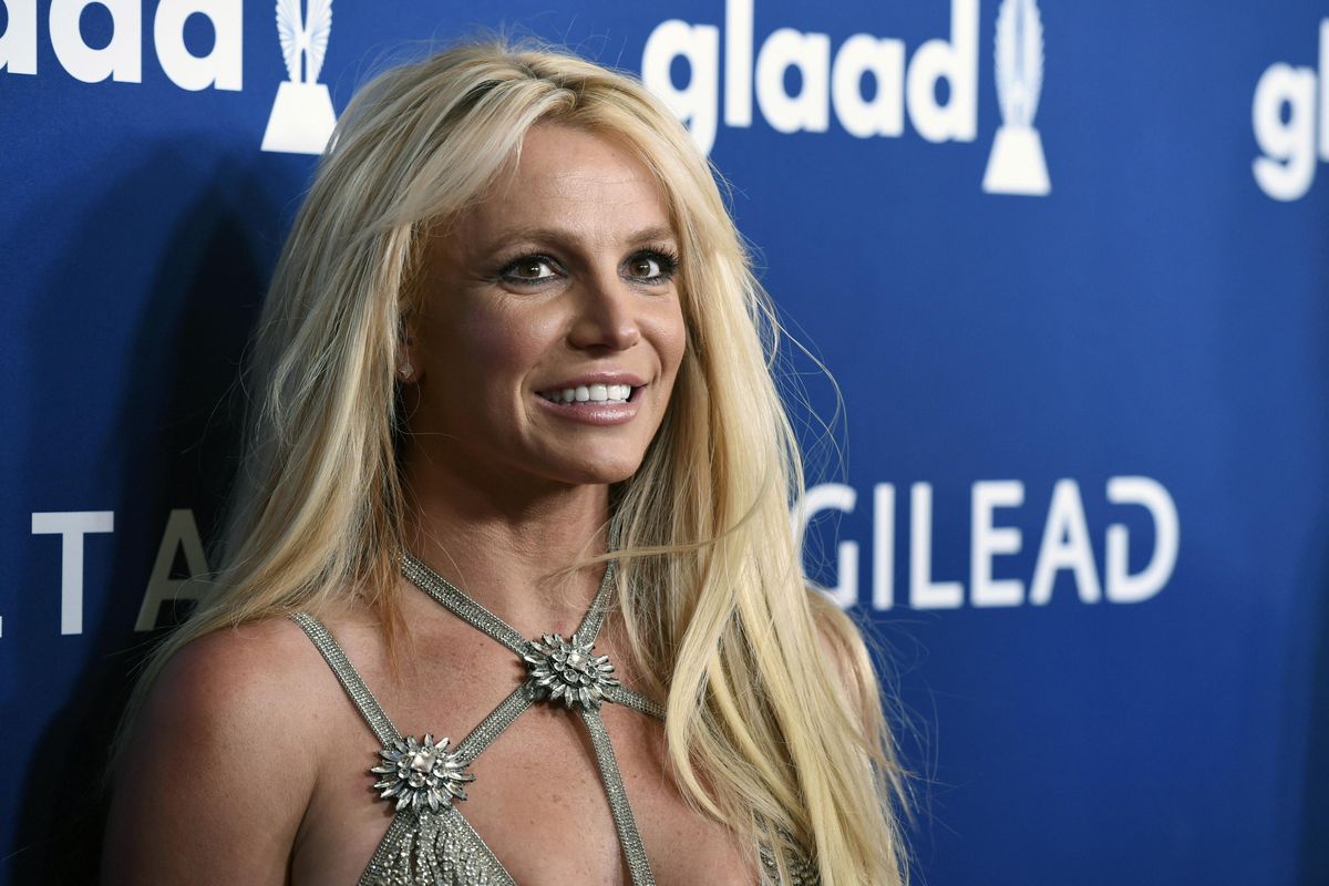 This April 12, 2018,  photo shows Britney Spears at the 29th annual GLAAD Media Awards in Beverly Hills, Calif. A Los Angeles judge is set to consider whether to extend a temporary restraining order taken out in the name of Spears against her former manager. The hearing Thursday, June 13, 2019, on the restraining order against Sam Lutfi is a resumption of one that began on May 28, with lawyers for Spears