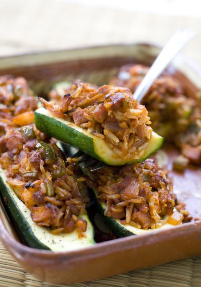 Jambalaya-Stuffed Zucchini adds a green vegetable to the traditional bold dish. (Associated Press)