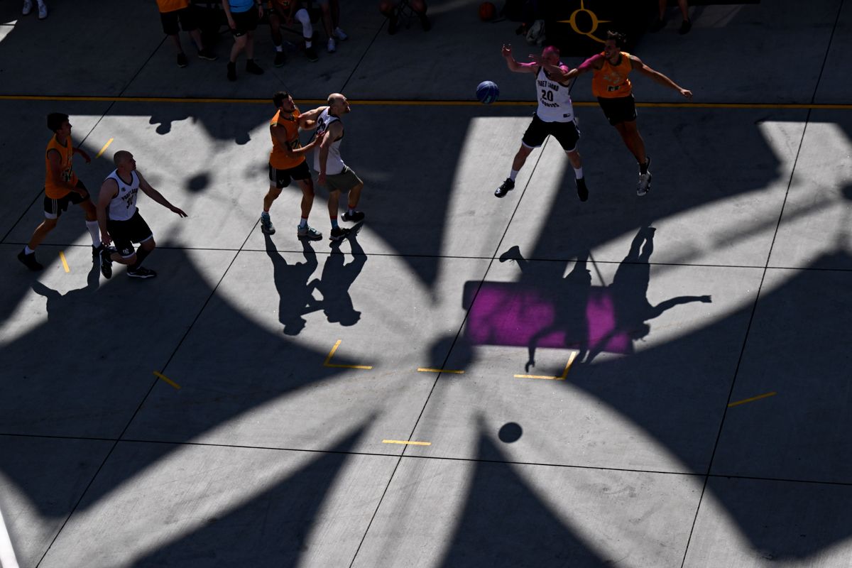 Basketball teams battle it out during a Hoopfest Elite Men’s game on Sunday, Jun. 30, 2024, in Spokane, Wash.  (Tyler Tjomsland/The Spokesman-Review)