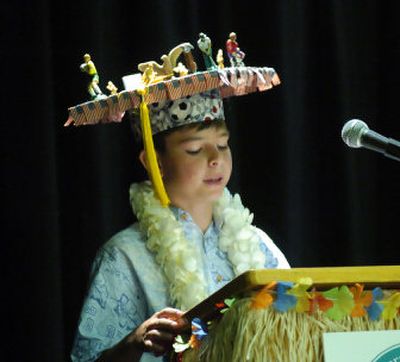 
Cole McNamara takes part in his fifth-grade promotion ceremony Thursday after officials made him cut off the guns held by plastic soldiers on his mortar board in Rancho Palos Verdes, Calif.Associated Press
 (Associated Press / The Spokesman-Review)