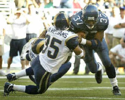 
Shaun Alexander and Seahawks plowed through the Rams last season in Seattle. 
 (Associated Press / The Spokesman-Review)