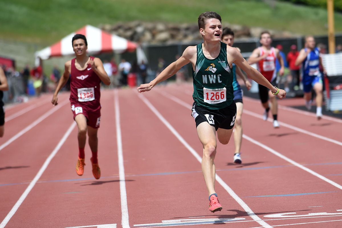 Northwest Christian’s Jack Ammon crosses the finish line in the State 2B 400 meters at Eastern Washington University in Cheney on Saturday, May 28, 2016. (Kathy Plonka / The Spokesman-Review)