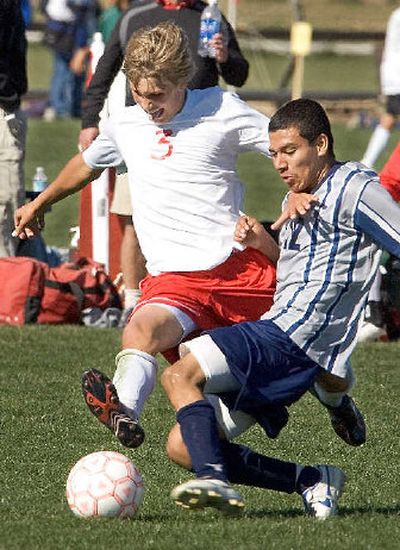 
Sandpoint senior Kyle Maeaux, left, attempts to dribble past Skyview's Gabriel Mora on Saturday. 
 (Matt Cilley Special to / The Spokesman-Review)