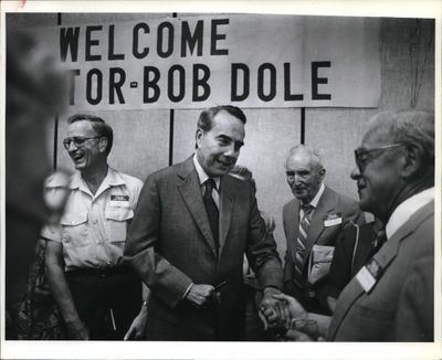 Sen. Bob Dole (R-Kan.) is greeted by supporters during a 1987 fundraising stop at the Inn at the Park in Spokane.  (Cowles Publishing)