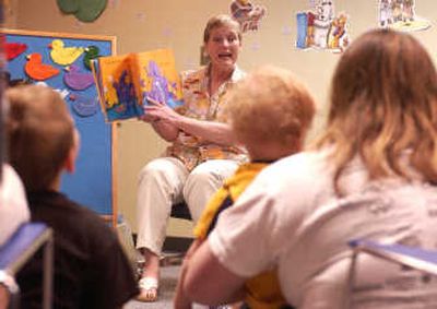 
Ruth Safranek, an information specialist and storyteller for the Spokane Valley Library, reads aloud, 