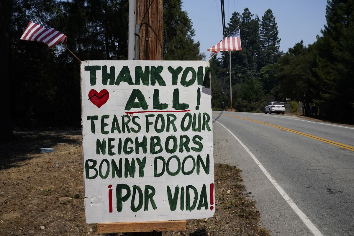 A thank you sign is posted along Empire Grade Rd. Tuesday, Aug. 25, 2020, in Bonny Doon, Calif., after the the CZU August Lightning Complex Fire passed by.  (Marcio Jose Sanchez)