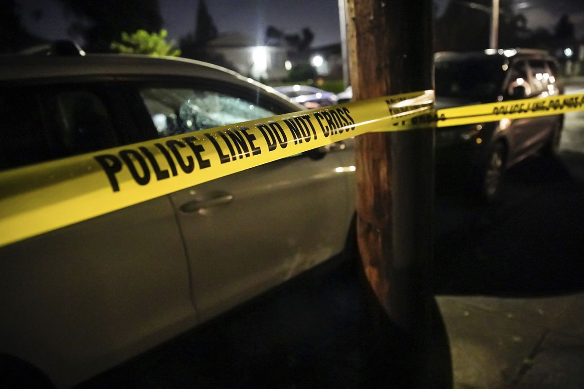 Portland police respond to a shooting in a house in the 4000 block of Southeast Boise Street on Sunday evening. Homicide detectives also responded.  (Mark Graves/The Oregonian)