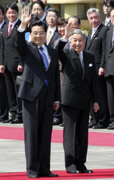 
Chinese President Hu Jintao, left, and Japanese Emperor Akihito attend a welcome ceremony at the Imperial Palace in Tokyo today.Associated Press
 (Associated Press / The Spokesman-Review)