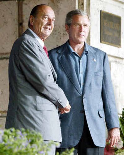 
President Bush greets French President Jacques Chirac on Wednesday.
 (Associated Press / The Spokesman-Review)