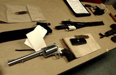 
Weapons found in a car belonging to Giovanni Malito are now in possession of the Spokane County Sheriff's Department Wednesday after he was arrested Tuesday.
 (Brian Plonka / The Spokesman-Review)