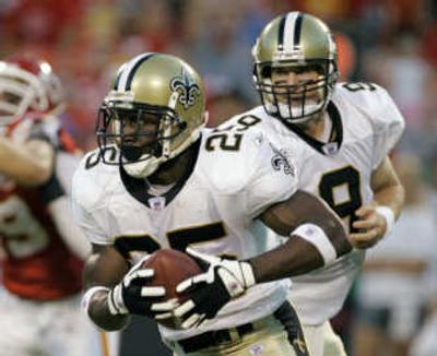 
Saints' Reggie Bush takes handoff from Drew Brees in game against the Chiefs.Associated Press
 (Associated Press / The Spokesman-Review)