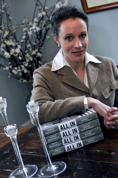 Paula Broadwell, shown in January, wrote the David Petraeus biography “All In.” Petraeus abruptly resigned Friday, admitting an extramarital affair with Broadwell. (Associated Press)