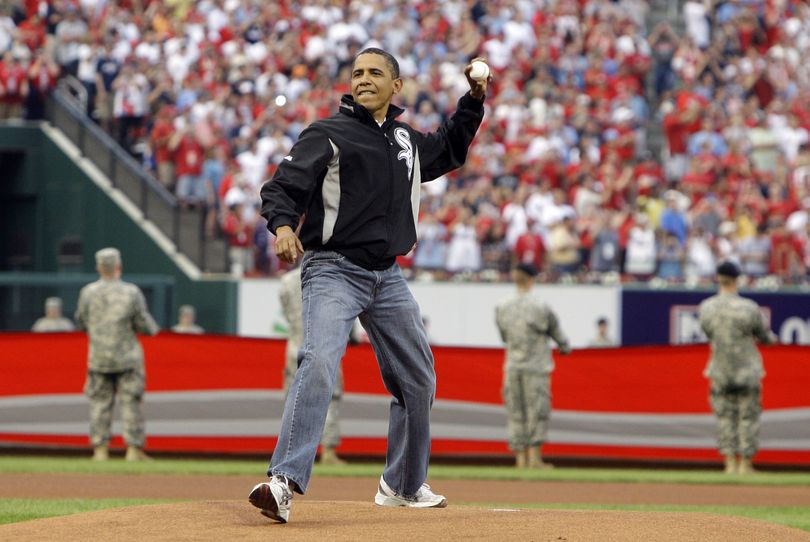 ORG XMIT: MOHG104 President Barack Obama throws out the first pitch to St. Louis Cardinals first baseman Albert Pujols, not pictured, before the MLB All-Star baseball game in St. Louis, Tuesday, July 14, 2009. (AP Photo/Haraz N. Ghanbari) (Haraz Ghanbari / The Spokesman-Review)