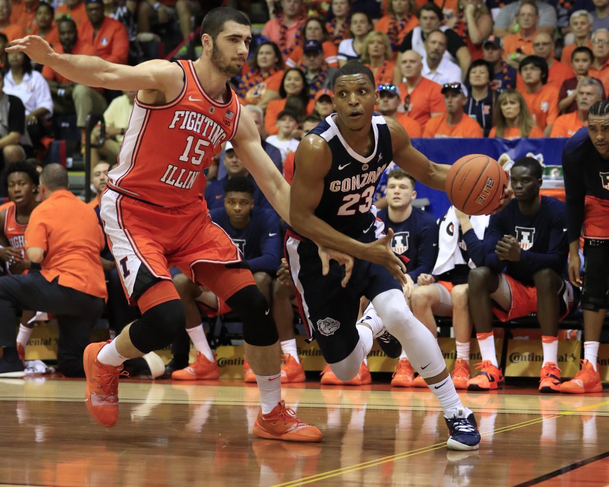 Gonzaga guard Zach Norvell Jr. dribbles past Illinois forward Giorgi Bezhanishvili during the first half of a first-round game at the Maui Invitational on Monday. (Marco Garcia / Associated Press photos)