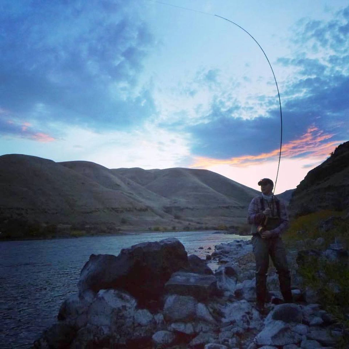 Fly fisher Tyler Comeau hooks up with a steelhead on the swing at the Snake River. (Wayne Jordan)