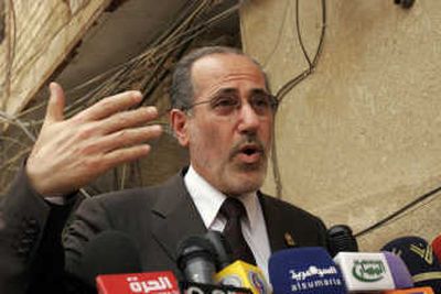 Iraq's national security adviser, Mouwaffak al-Rubaie, speaks to reporters in Najaf on Tuesday. Associated Press
(Associated Press / The Spokesman-Review)
