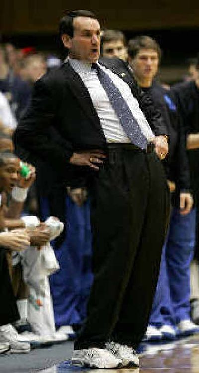 
Duke coach Mike Krzyzewski suffered from light-headedness after standing up too quickly and collapsed momentarily in win over Georgia Tech. 
 (Associated Press / The Spokesman-Review)