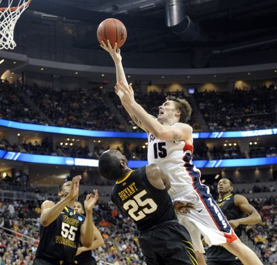 Ryan Spangler of Gonzaga drives to score but is called for the charging foul during early action against West Virginia during their second round game of the NCAA Tournament in Pittsburgh on March 15. Spangler has decided to not return to Gonzaga. (Christopher Anderson)